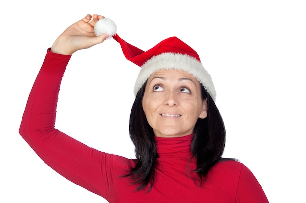 Playful girl with Christmas hat on a over white background