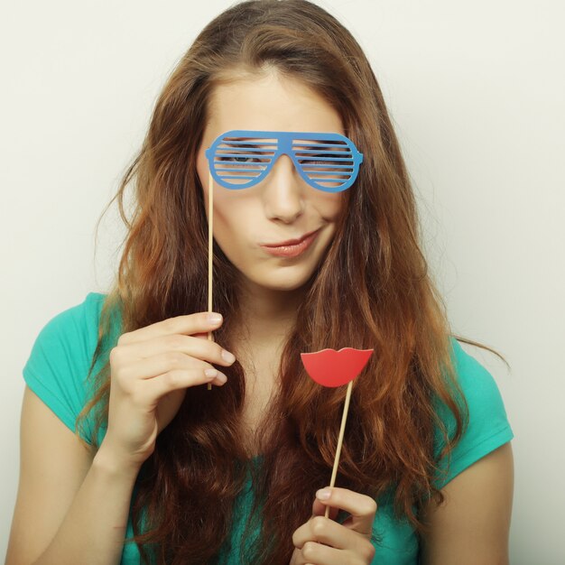 Playful young woman ready for party