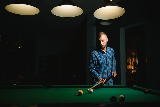 Playing billiard - Close-up shot of a man playing billiard