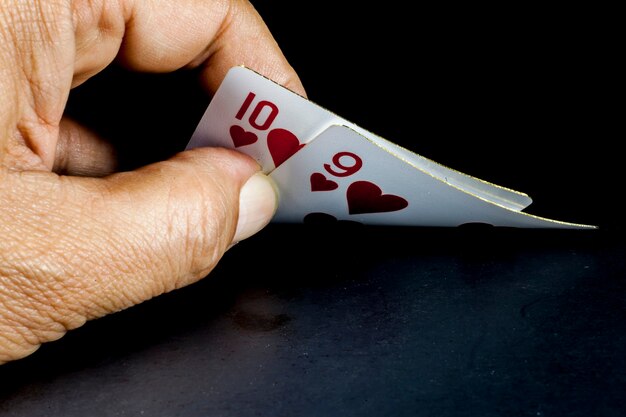 Playing cards on black background