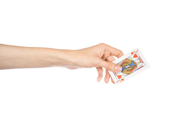 Playing cards in hand isolated on white background