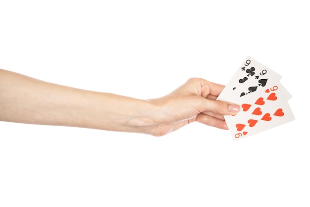 Photo playing cards in hand isolated on white background