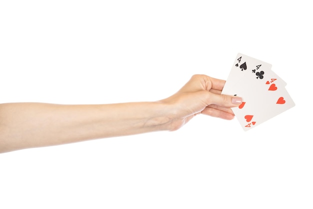 Playing cards in hand isolated on white background