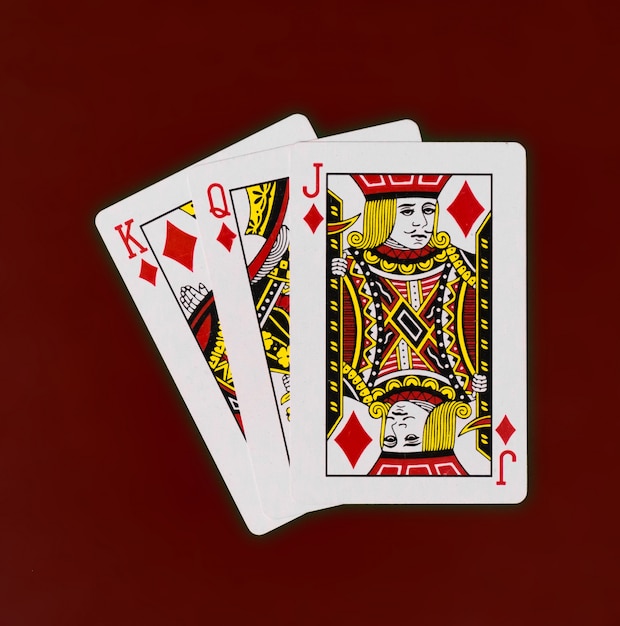 Playing cards king queen jack deck with red background casino\
poker