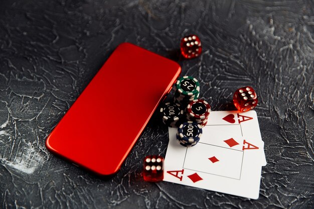 Playing chips cards red dices and smartphone