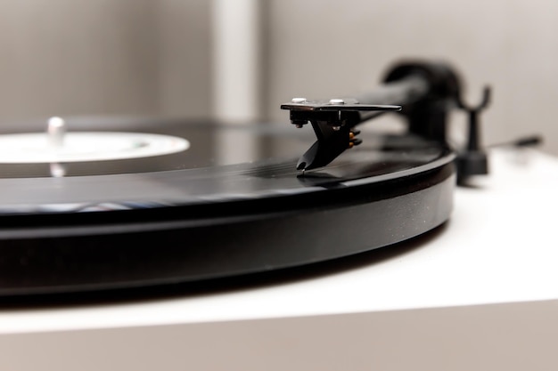 Playing an old vinyl Dust on the turntable Needle closeup