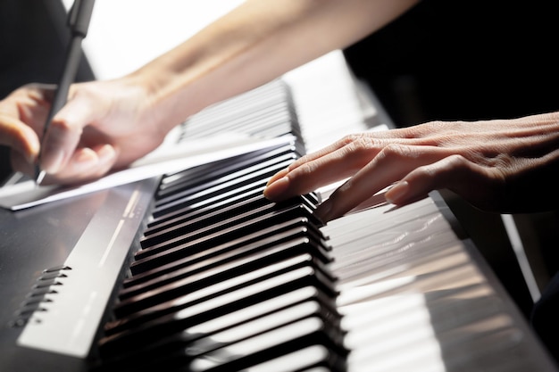 Playing piano close up