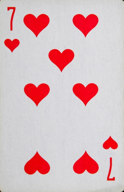 Photo the playing seven card of hearts the suit of hearts