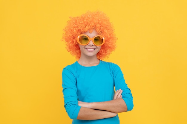 Pleasant smile happy childhood girls birthday party happy funny kid in curly wig time for fun