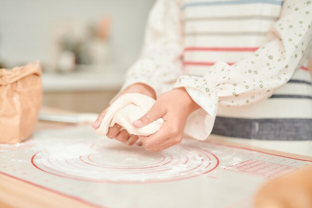 Pleasant woman cooking in the kitchen