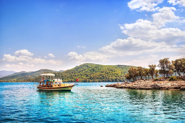 Pleasure ship in the bay Sedir island Aegean sea Marmaris Turkey