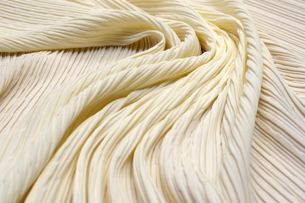 Pleated polyamide fabric. Ivory. Texture, 