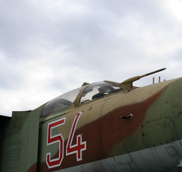 Plexiglas cabin of a military jet fighter with a directional antenna detailed stock photo