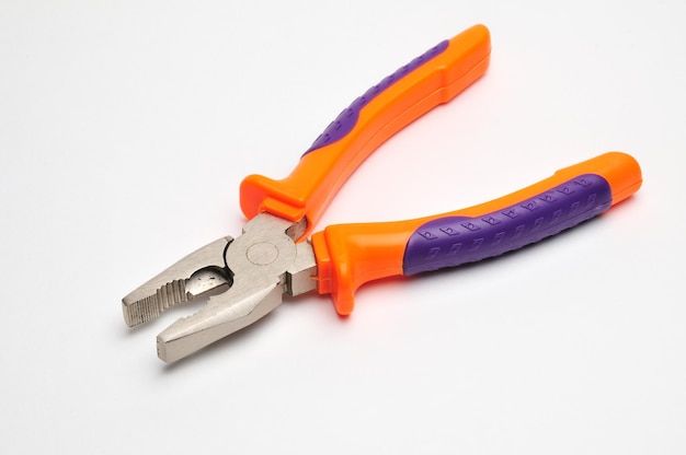 Pliers for various jobs on a white background