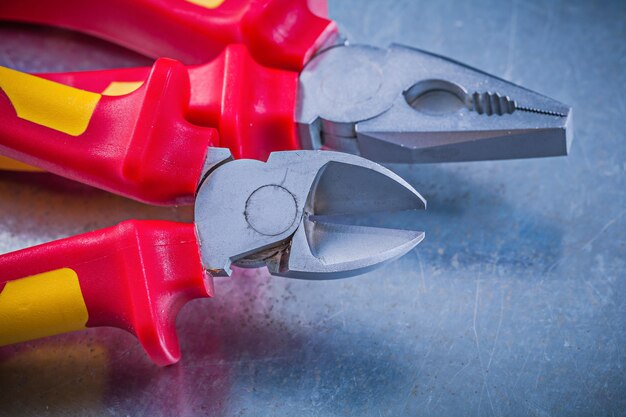 Pliers wire cutter on metallic background horizontal image elect