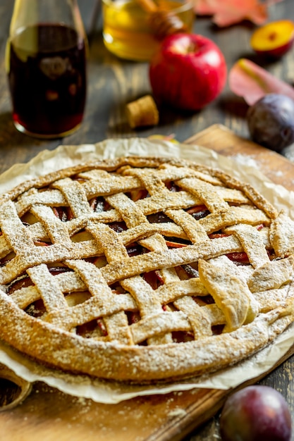 Plum apple pie. Cooking. Recipes. Vegetarian food.