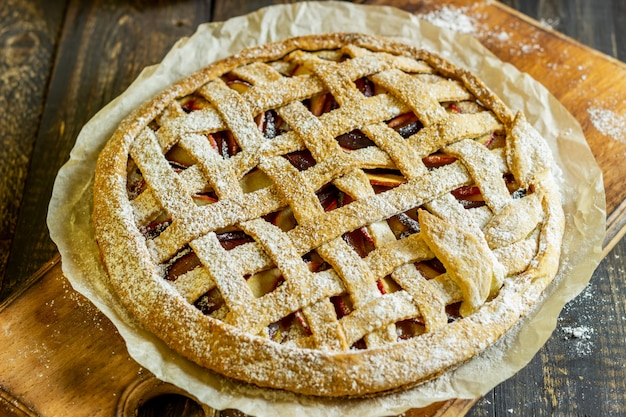 Plum apple pie. Cooking. Recipes. Vegetarian food.