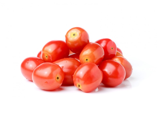 Plum tomatoes on white