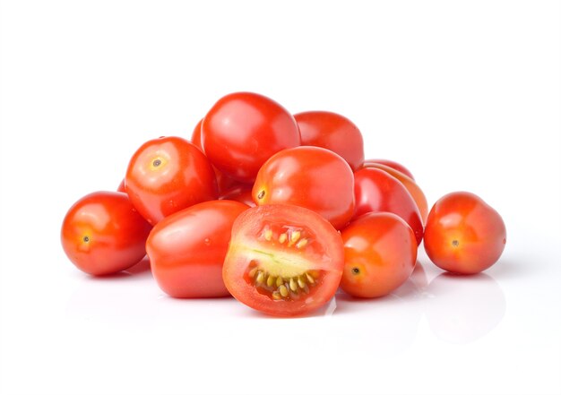 Plum tomatoes on white