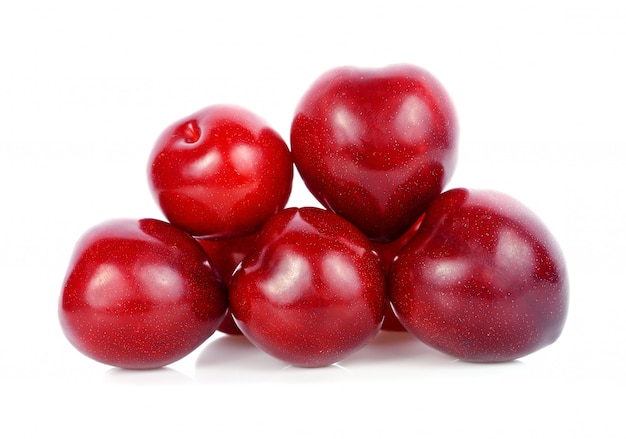 Plums isolated on white background