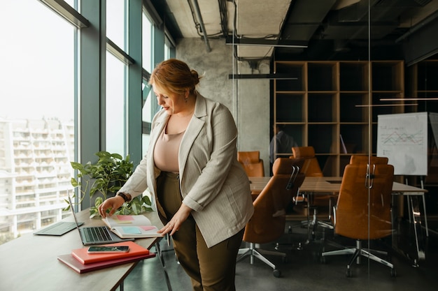 Plus-size business woman working in a professional office