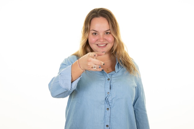 Plus size girl in blue shirt woman portrait front hand fingers on white background