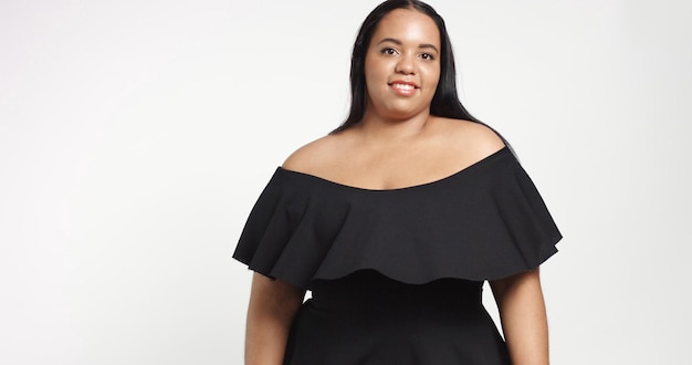 Plus size model in studio shoot happy smiling