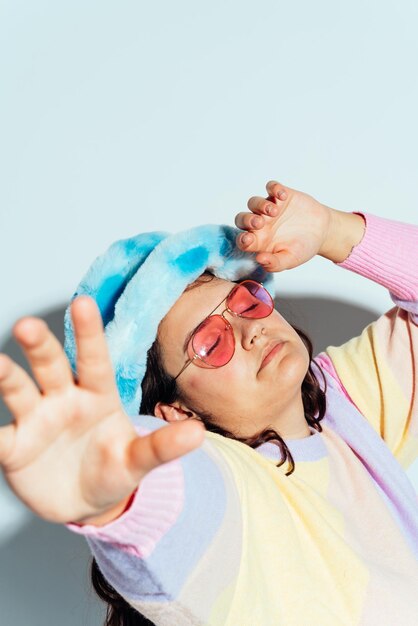 Plus size woman model posing in studio and having fun