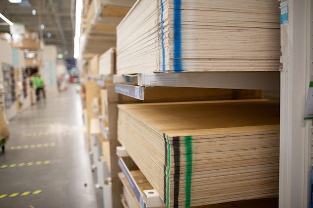 Plywood of different sizes in the store shelf.