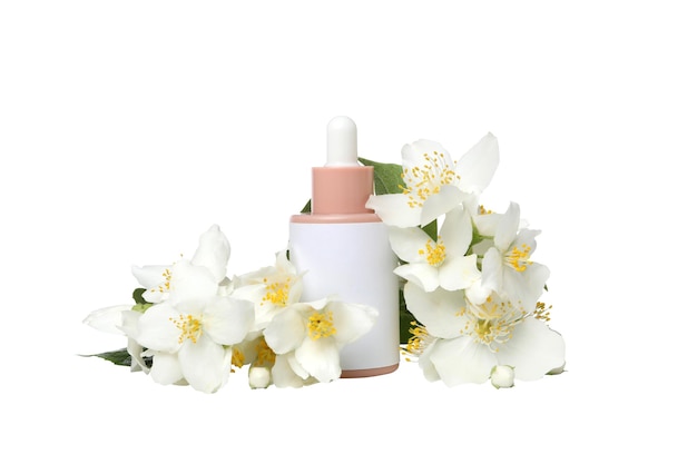 パプア・NG ジャスミンの花と白い背景に隔離された化品のボトル