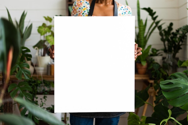 png sign mockup held by plant lady