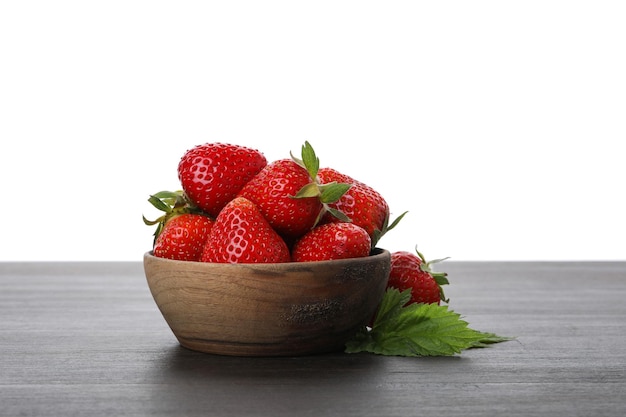 PNG strawberries in bowl on table isolated on white background