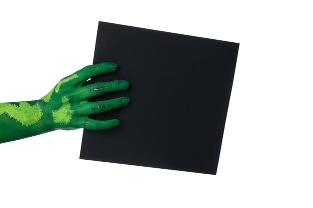 PNG zombie hands holding a sheet of black paper isolated on white background