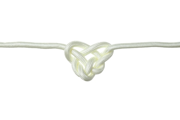 Foto pngnodo celtico a forma di cuore fatto di cordone bianco concetto di unità creativa, fede e protezione isolato su sfondo bianco