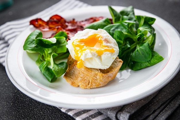 poached egg breakfast bacon green leaves salad mix meal food snack on the table copy space food