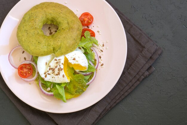 Poached egg on healthy bread with avocado.