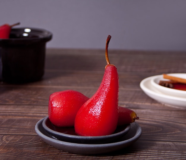 Poached pears in red wine with spices.