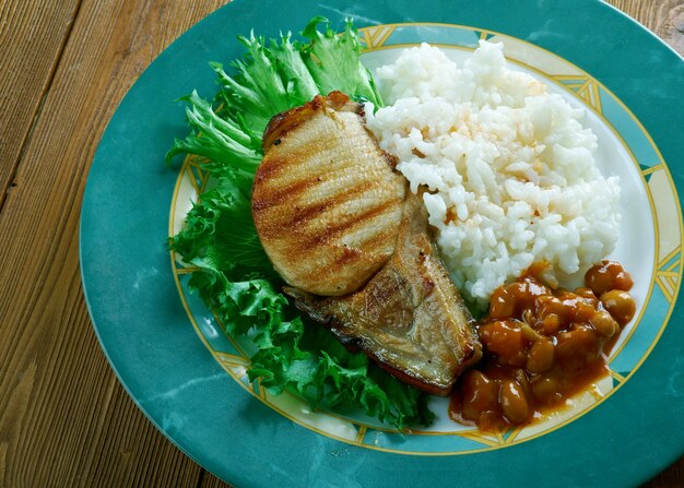 Poc Chuc Mexican dish of meat, commonly pork,  prepared in citrus marinade and cooked over a grill.