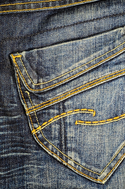 Pocket of the blue jeans.  Fabric background