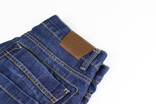 Pocket and rivet on jeans. The top part of jeans. Copy space.