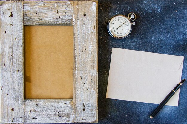 Photo pocket watch made in ussr pencil and letter high angle view