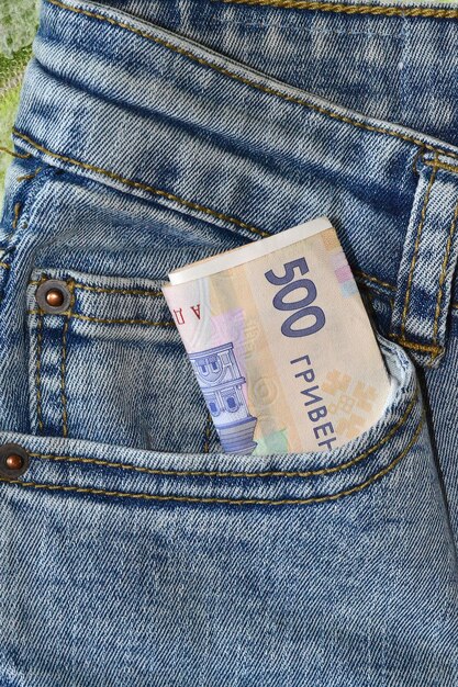 Photo in the pocket of women039s jeans there is ukrainian money five hundred hryvnias