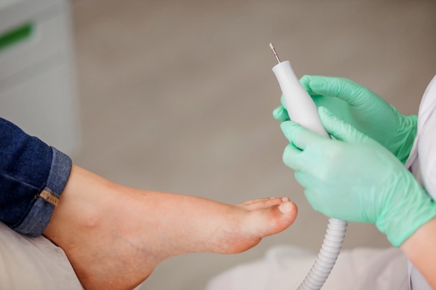 Podiatry doctor preparing the tool