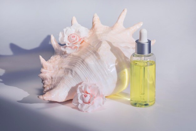 Podium with mock up product presentation Scene with roses shell and bottle High quality photo