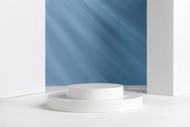 Podiums for presentation and cosmetic. Natural beauty pedestal in sunlight. Shadow on blue wall. Photography