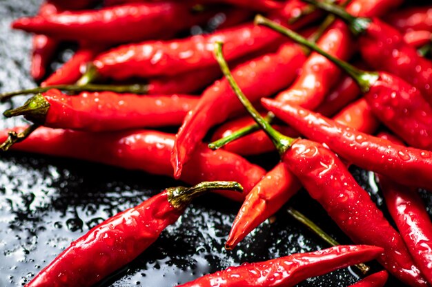 Pods of hot chili peppers on the table