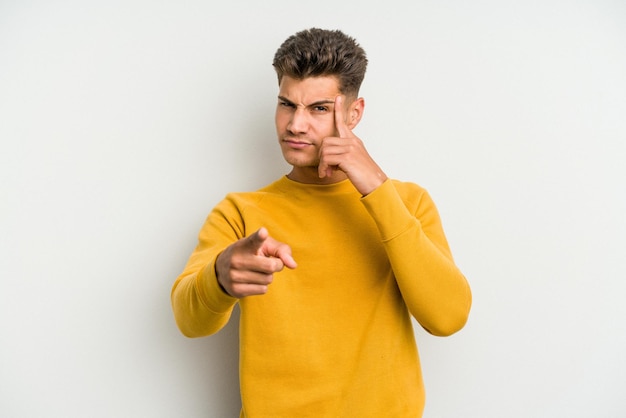 Pointing temple with finger thinking focused on a task