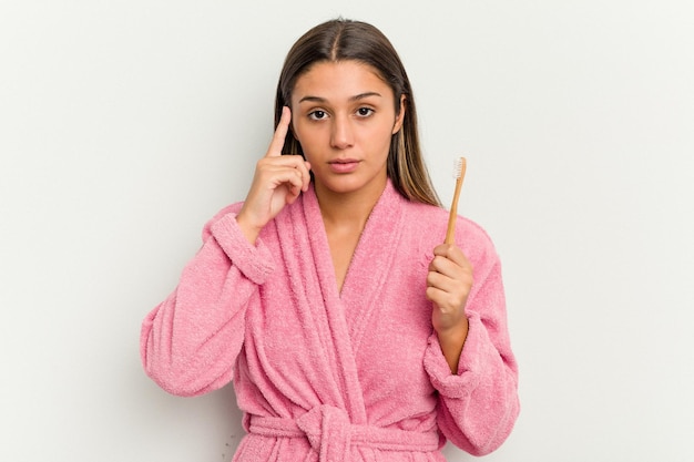 Pointing temple with finger thinking focused on a task