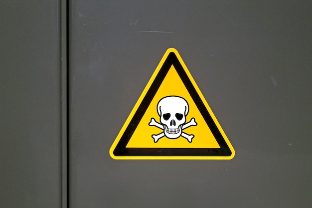 Photo poison sign on a metal door