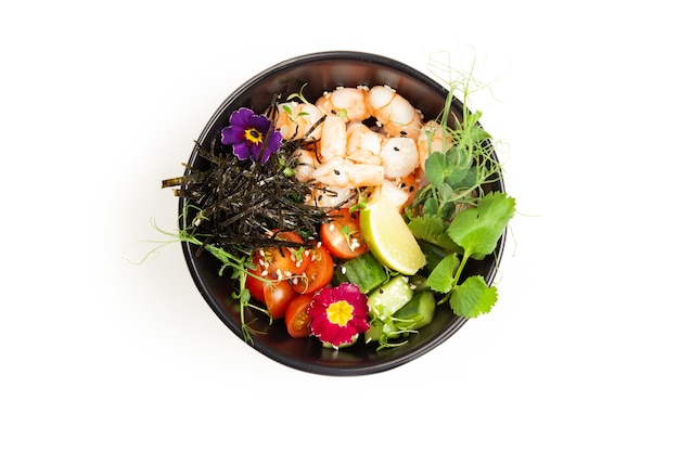 Poke salad with shrimp in a bowl ingredients shrimp blanched\
spinach cherry tomatoes rice cucumber soyginger sauce spicy sauce\
nori sesame lime cilantro asian seafood salad concept